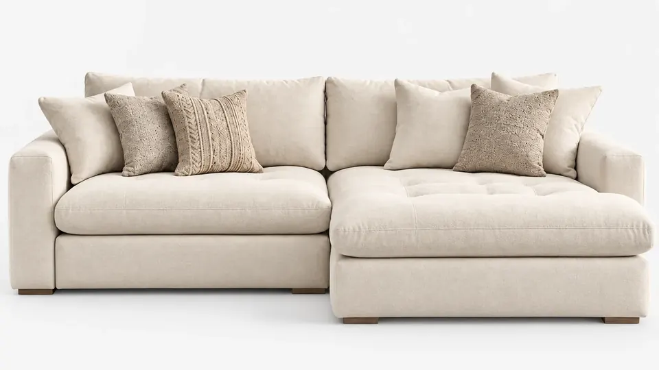 Sofá bege com chaise, visto de frente.